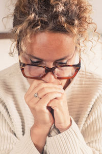 Close-up of young woman drinking water