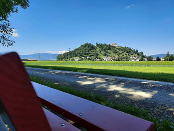 Scenic view of field against blue sky