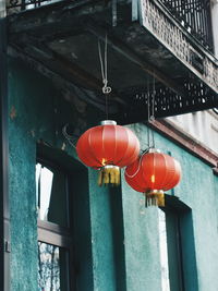 Red lanterns by building in city