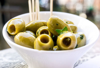 Close-up of green olives in bowl