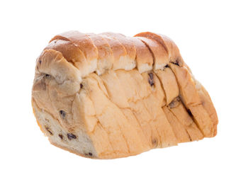 Close-up of bread against white background