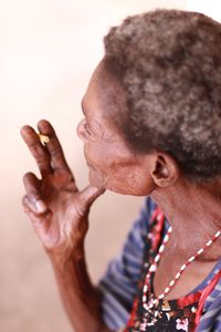 Side view of an elderly woman looking away