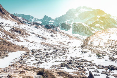 Solo man hiking on italian alps mountain range italy concepts about travel lifestyle and wanderlust