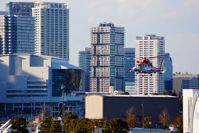 Modern buildings in city against sky