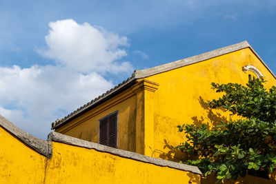 Hoi an yellow painted house in ancient town. taken in hoi an, vietnam