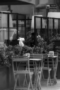 Empty chairs and table at restaurant