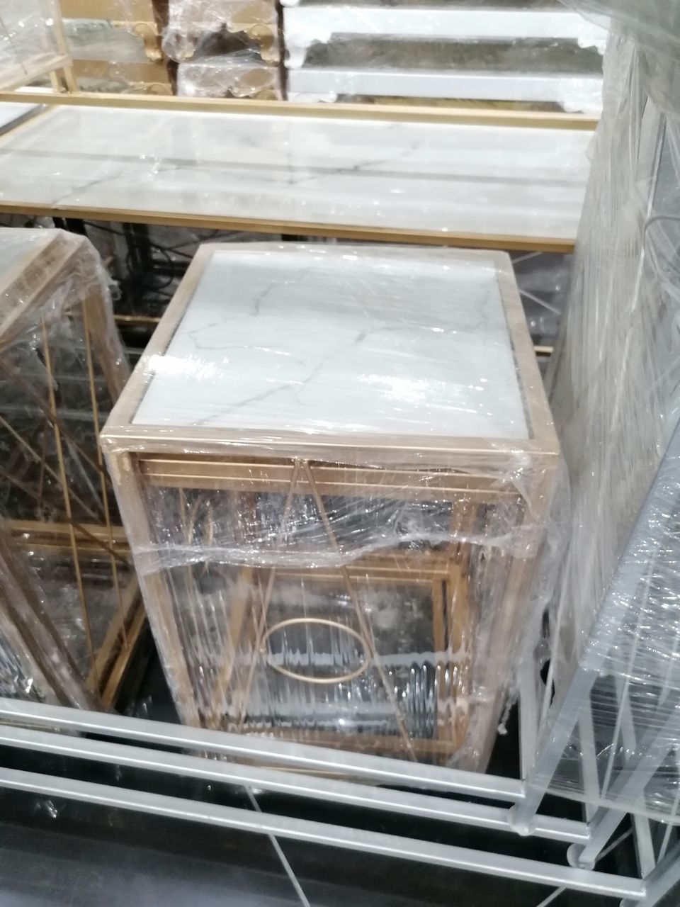 HIGH ANGLE VIEW OF GLASS CONTAINER ON STORE