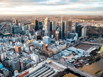 High angle view of cityscape against sky during sunset