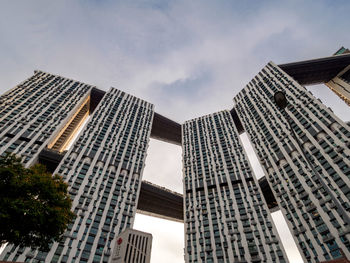 Low angle view of modern buildings against sky