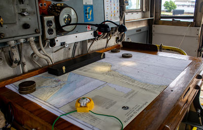 High angle view of machinery on table