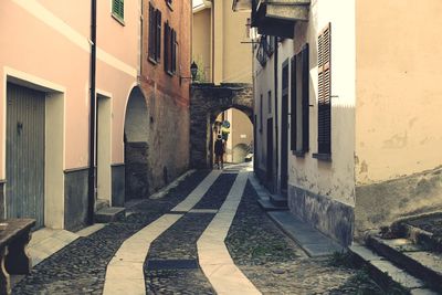 Rear view of woman walking on street