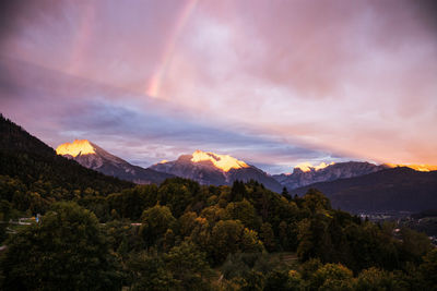 Scenic view of mountains against cloudy sky