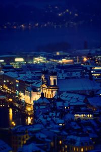 High angle view of buildings at night