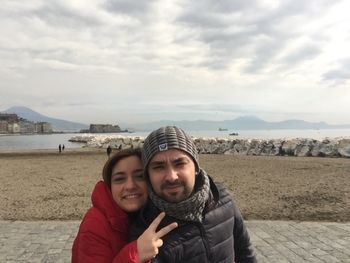 Portrait of woman standing on beach