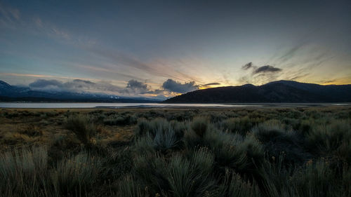 Scenic view of landscape against sky during sunset