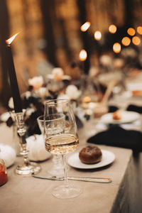 Close-up of wineglasses on table