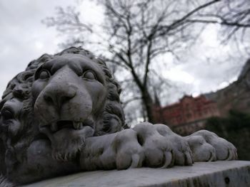 Low angle view of statue against sky