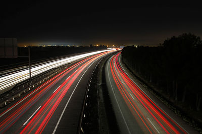 Long exposure shot of highway at night with blurred lights