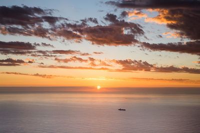 Scenic view of sea at sunset