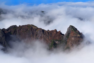 View of mountain amidst cloudscape