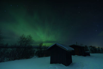 Low angle view of house against sky at night