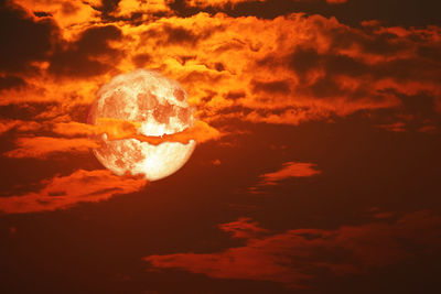 Scenic view of dramatic sky during sunset