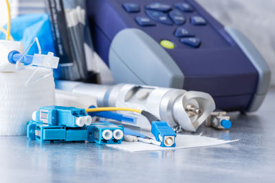 Close-up of equipment on table