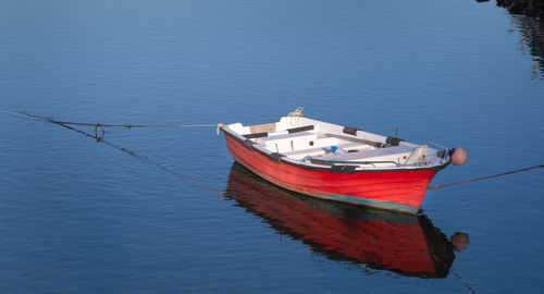 High angle view of sailboat moored in lake