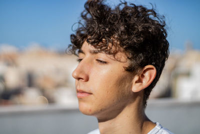 Close-up of man looking away