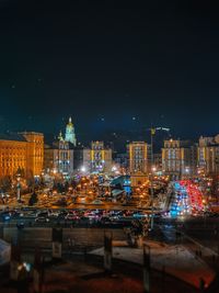 Illuminated buildings in city at night