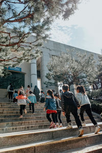 Group of people in front of building