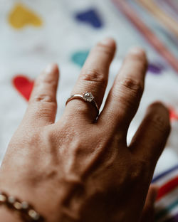 Close-up of human hand with ring