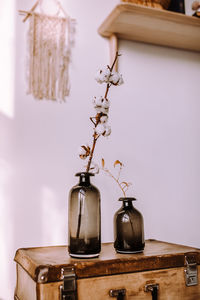 Close-up of electric lamp on table at home