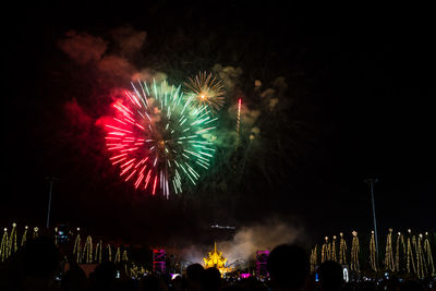 Low angle view of sky illumed with fire crackers