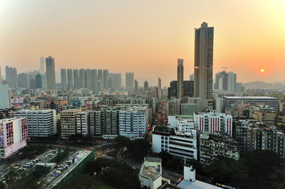 Hong kong cityscape against sky