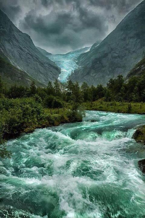 water, beauty in nature, scenics, mountain, flowing water, nature, sky, tranquil scene, motion, river, tranquility, flowing, waterfront, waterfall, cloud - sky, idyllic, stream, lake, cloudy, tree