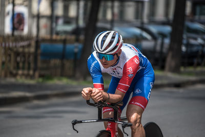 Man riding bicycle on city