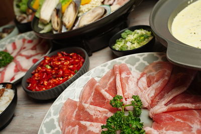 High angle view of chopped vegetables in bowl on table