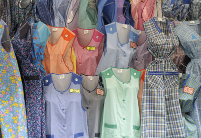 Colorful nightdresses at market stall