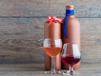 Close-up of wine bottles on table