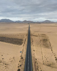 Scenic view of desert against sky