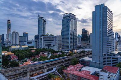 Bangkok, thailand - 10 august 2022 - aerial view of bangkok cityscape high-rises and bts skytrains