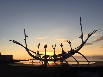 Scenic view of sea at sunset