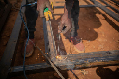 Man working on wood