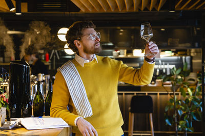 Man standing in a restaurant