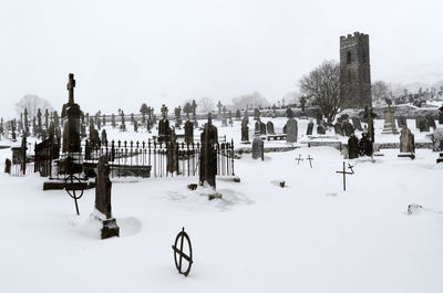 Cemetery with watchtower in winter