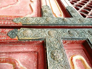 Close up of red carving on wall