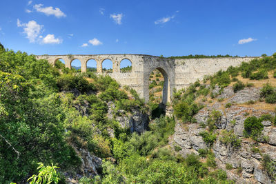 Low angle view of bridge against sky