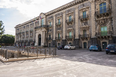 People in front of historic building