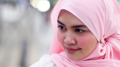 Close-up portrait of smiling girl